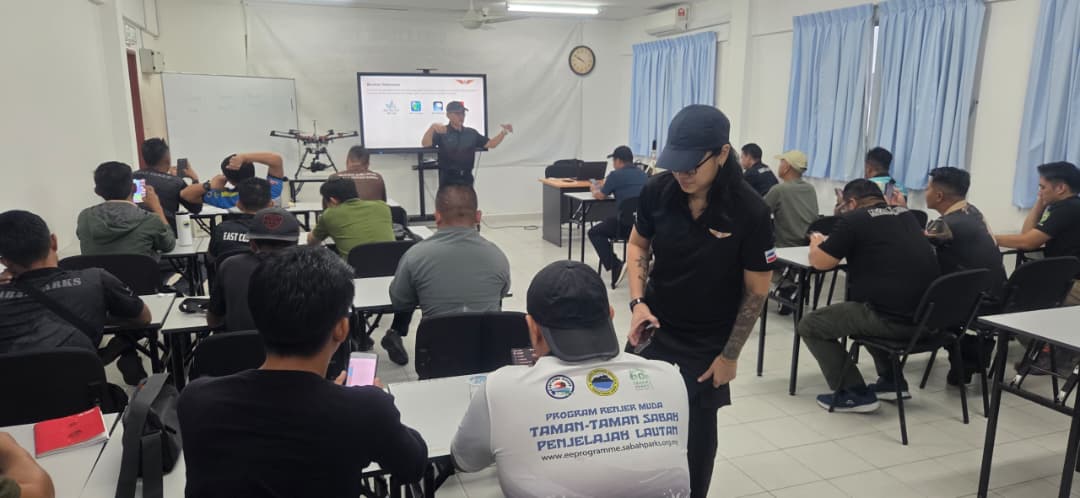 Participants attending a drone training workshop